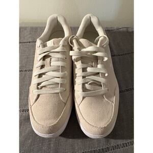 Women’s Under Armour size 8 off white Suede tennis shoes with gummy soles.